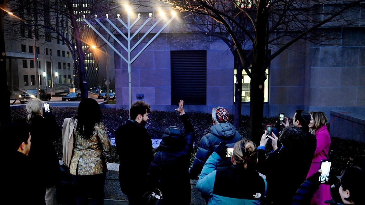 Kansas City Jewish leaders celebrate the second night of Hanukkah with the lighting of a 12-foot-tall menorah outside City Hall. The group said the display of unity is a first step in combating rising antisemitism.