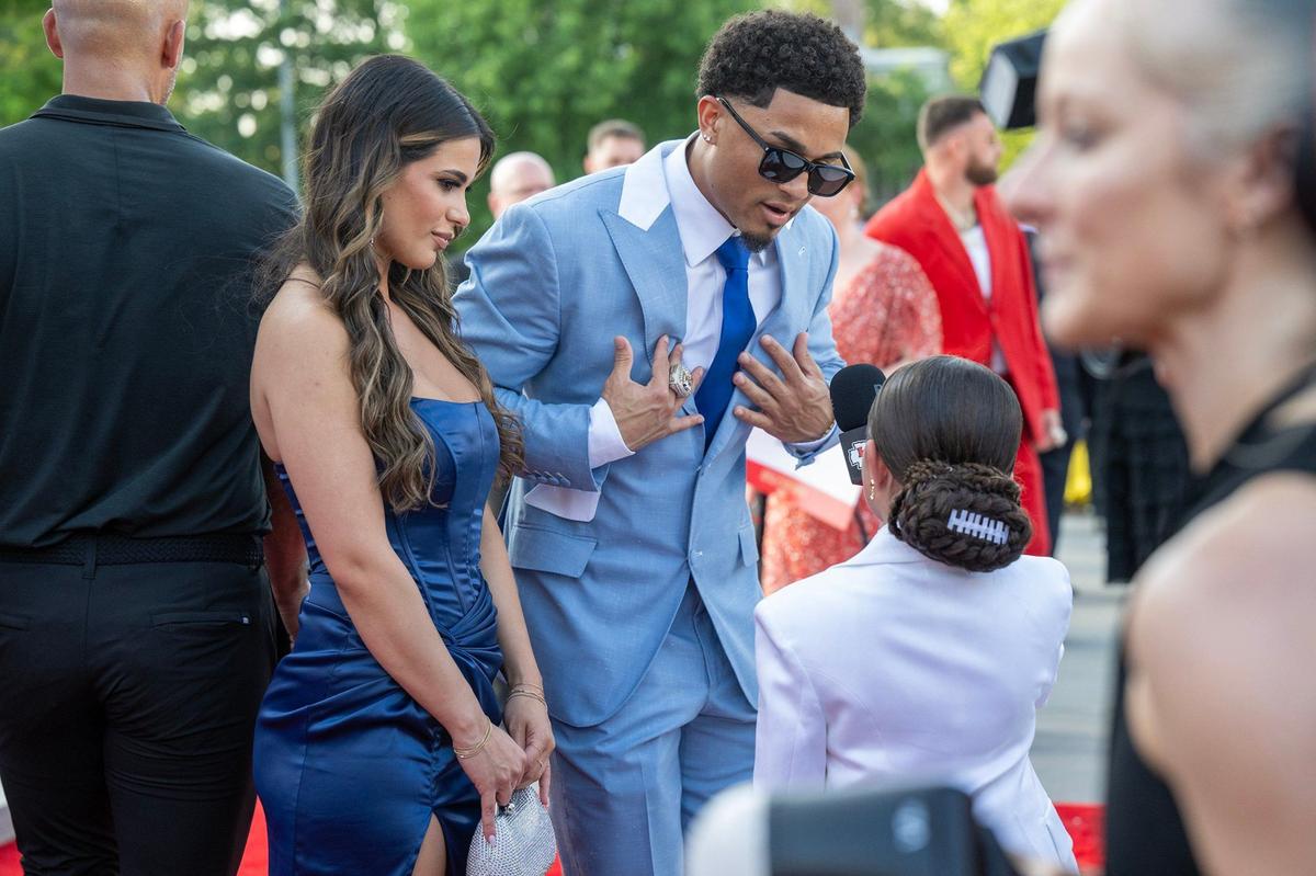 Chiefs Trent McDuffie on the red carpet before the Super Bowl LVIII championship ring presentation event.