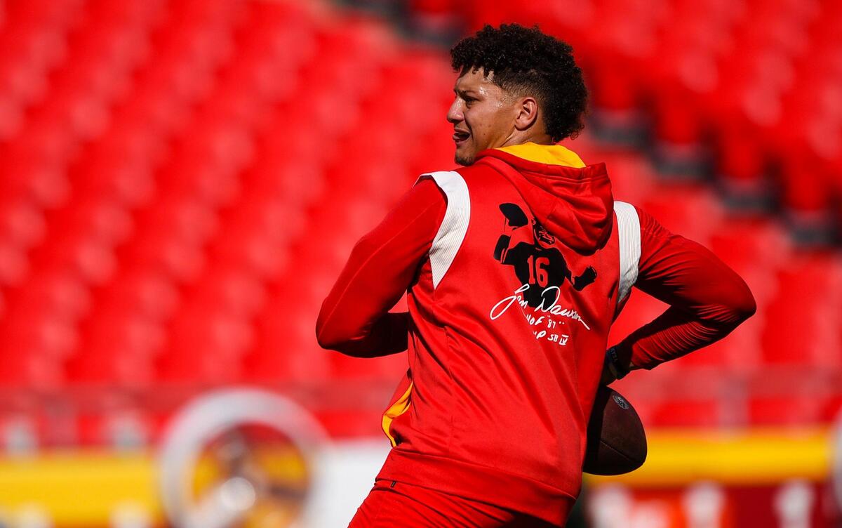 Kansas City Chiefs quarterback Patrick Mahomes wore a hoodie with a tribute to Len Dawson on it while he warmed up before the preseason game with the Green Bay Packers Thursday, August 25, 2022, at Arrowhead Stadium.