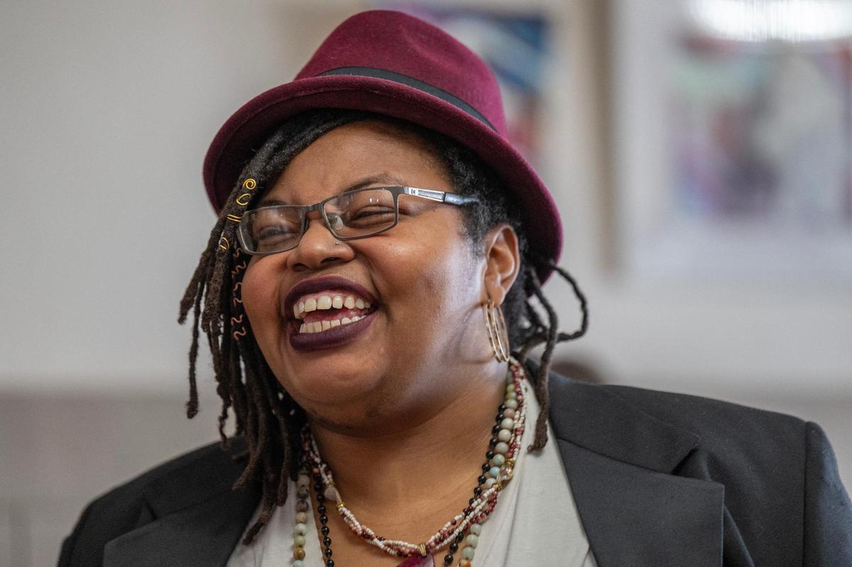 Melissa Ferrer Civil speaks to guests at City Hall after she was named Kansas City’s first poet laureaate on the first day of Black History Month.