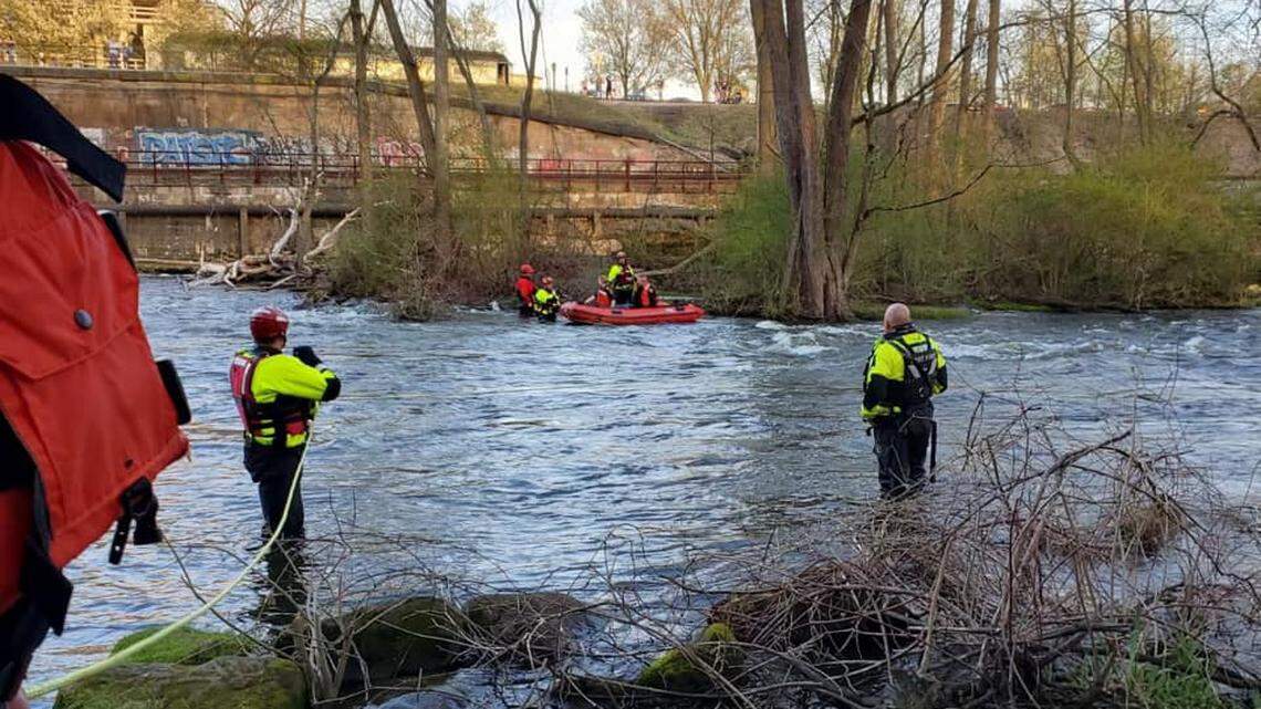 A kayaker saved a child and her mother in a river near Kent, Ohio, officials said.