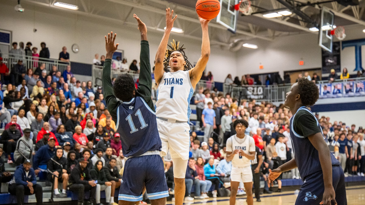 Lee’s Summit West’s Bryce Mitchell goes up for a shot against Oak Park during Saturday’s nightcap at the 810 Varsity Showcase 34 event.