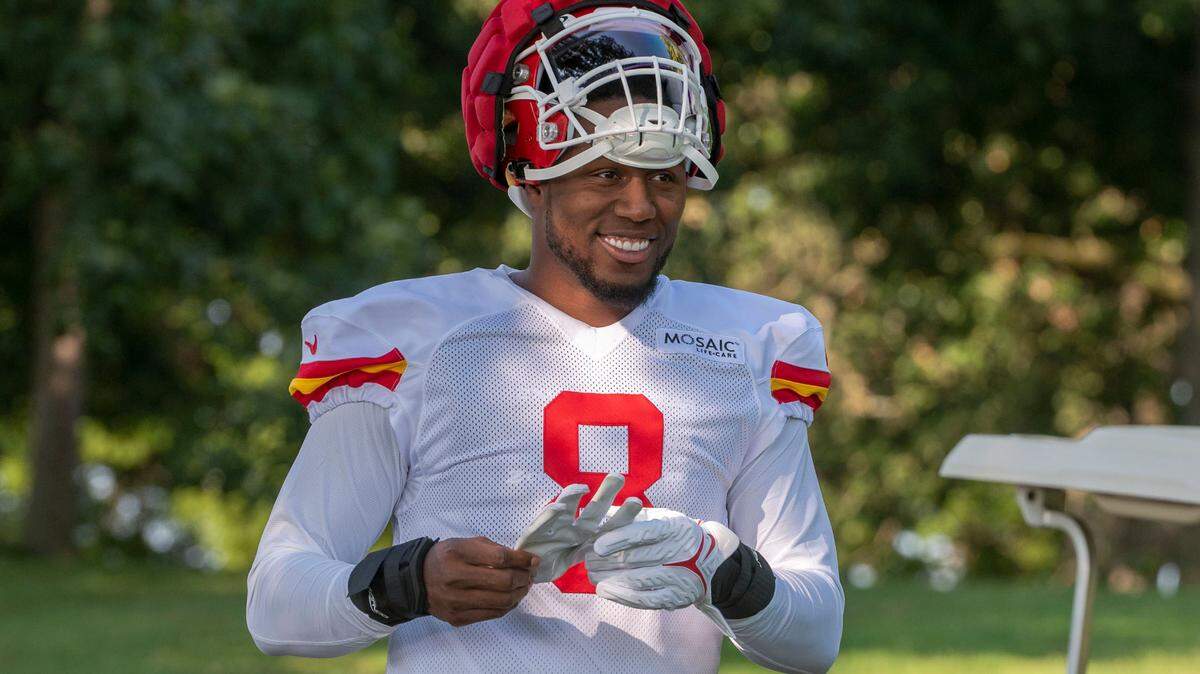 Kansas City Chiefs defensive end Carlos Dunlap (8) walks down to the field for practice at Chiefs training camp on Thursday, Aug. 4, 2022, in St. Joseph.