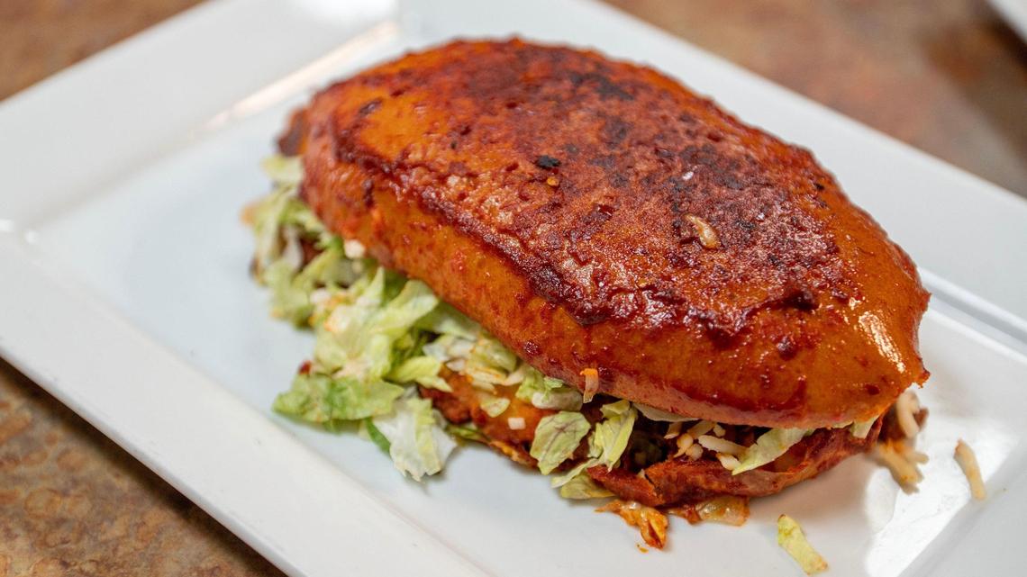 At KC restaurant, you can’t eat this Mexican sandwich without making a delicious mess