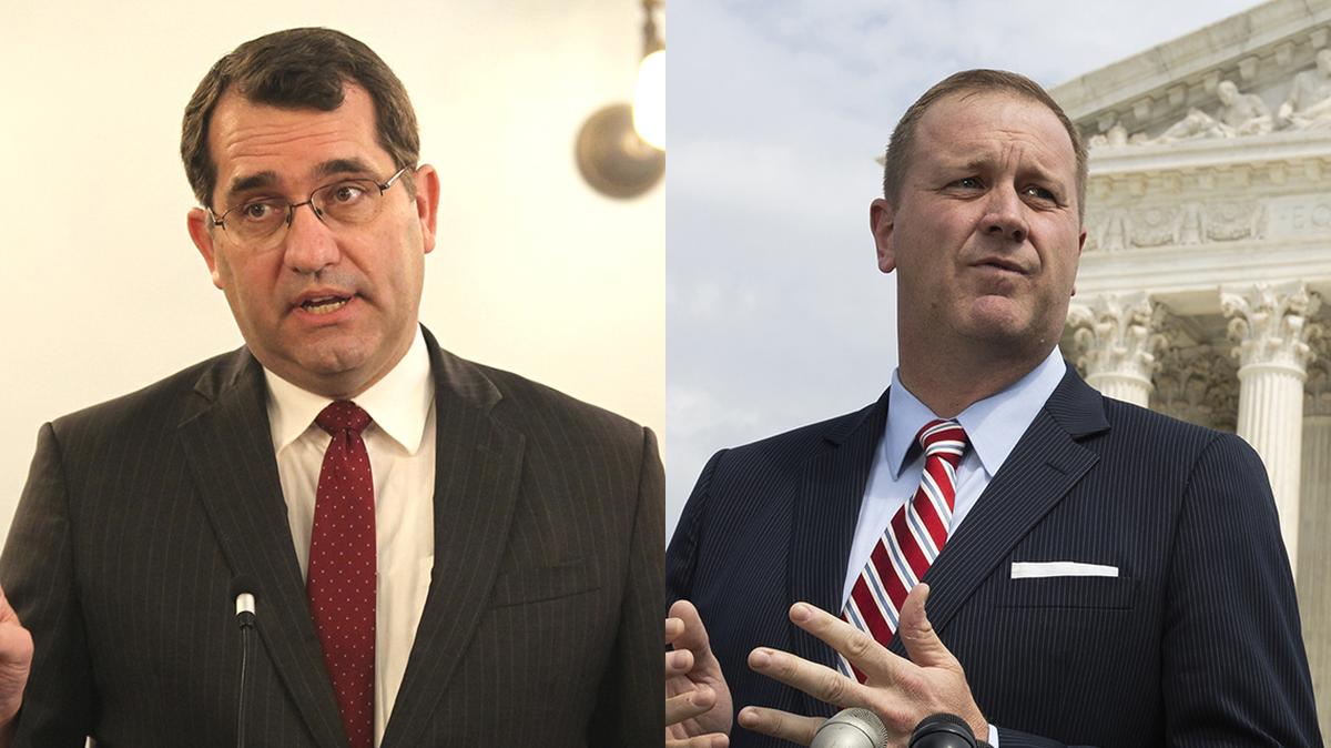 Attorneys General Derek Schmidt of Kansas, left, and Eric Schmitt of Missouri, right