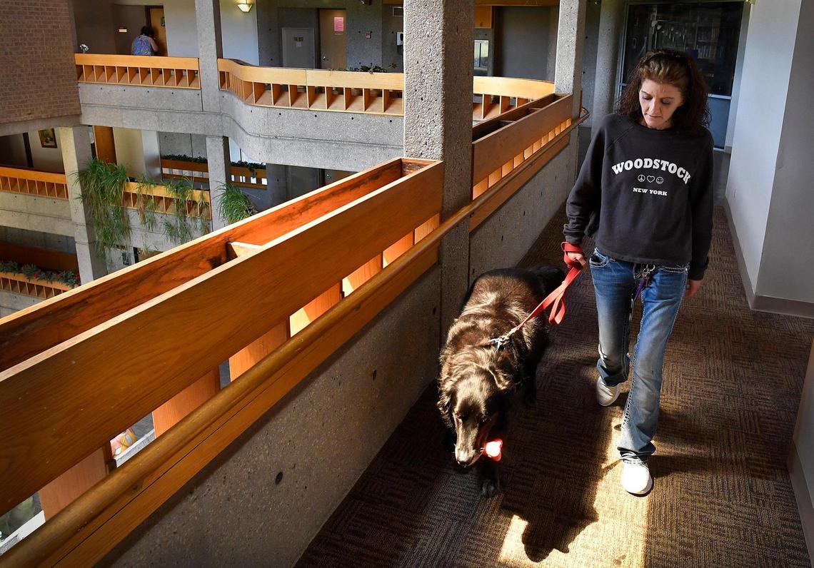 After spending some time outside playing, Suzette Hudspeth and Ceasar return home to her apartment. Residents of the building are used to always seeing the two together.