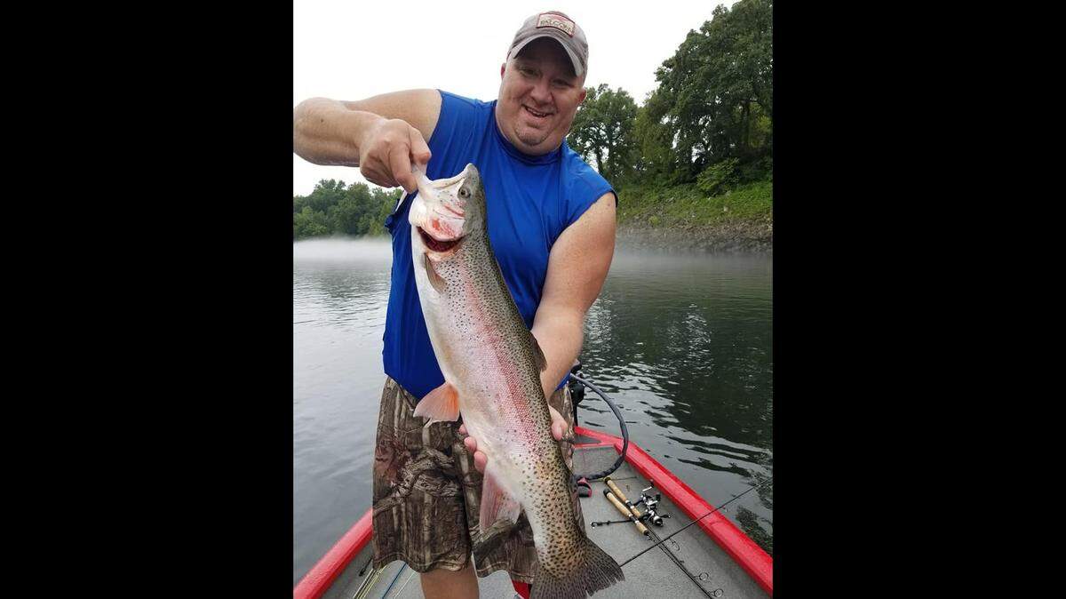 Travis Swift has been fishing Lake Taneycomo for 30 years. He caught his personal-best rainbow trout, measuring 25 inches and weighing 10 pounds, 12 ounces, on 2-pound test line with a homemade jig.