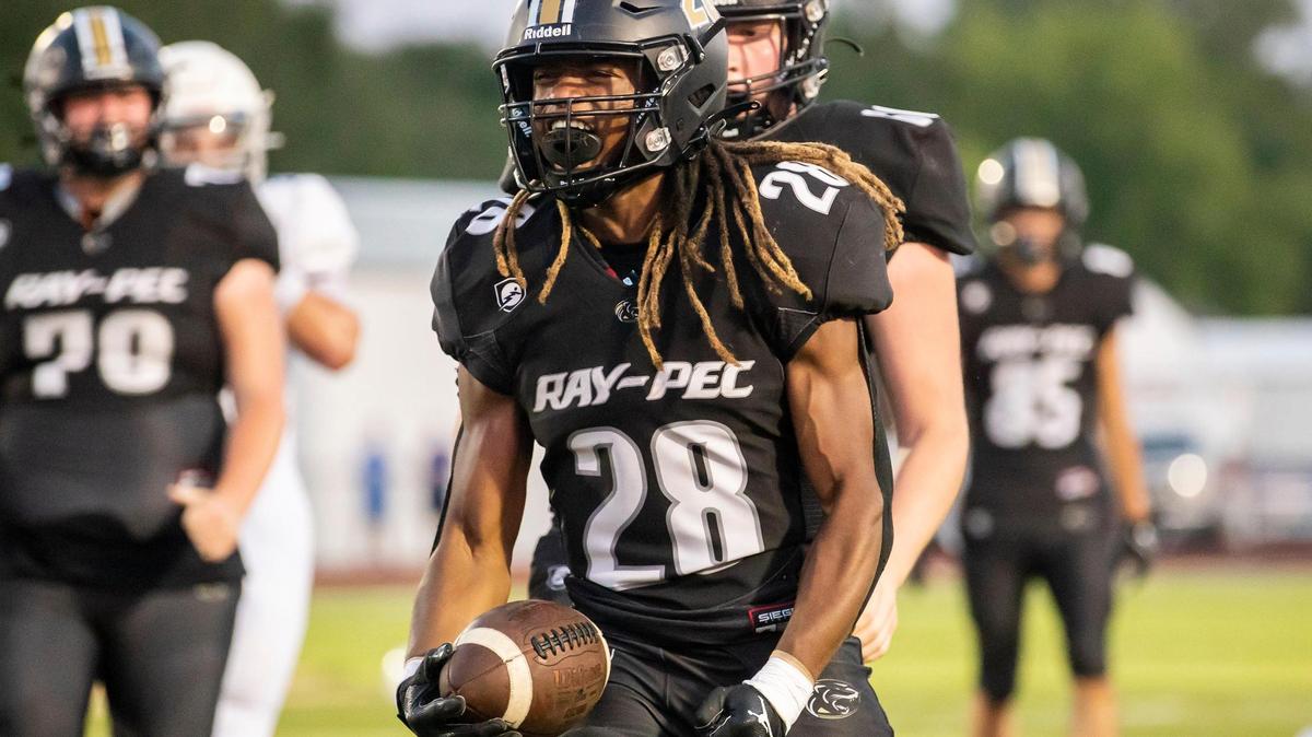 Ray-Pec sophomore running back DeZephen Walker (28) celebrates his scoring run during the game between the Raymore-Peculiar Panthers and the Rockhurst Hawklets on Friday August 26, 2022 in Raymore, MO.