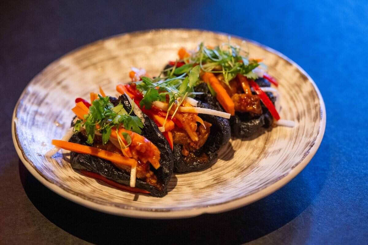 Squid Ink Bao Buns from the menu at The Fold, a new restaurant in the Crossroads, on Saturday, June 27, 2026. in Kansas City.