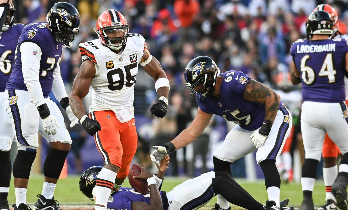 Cleveland Browns defensive end Myles Garrett (95) reacts after sacking Baltimore Ravens quarterback Lamar Jackson (8) during the second half at M&T Bank Stadium.