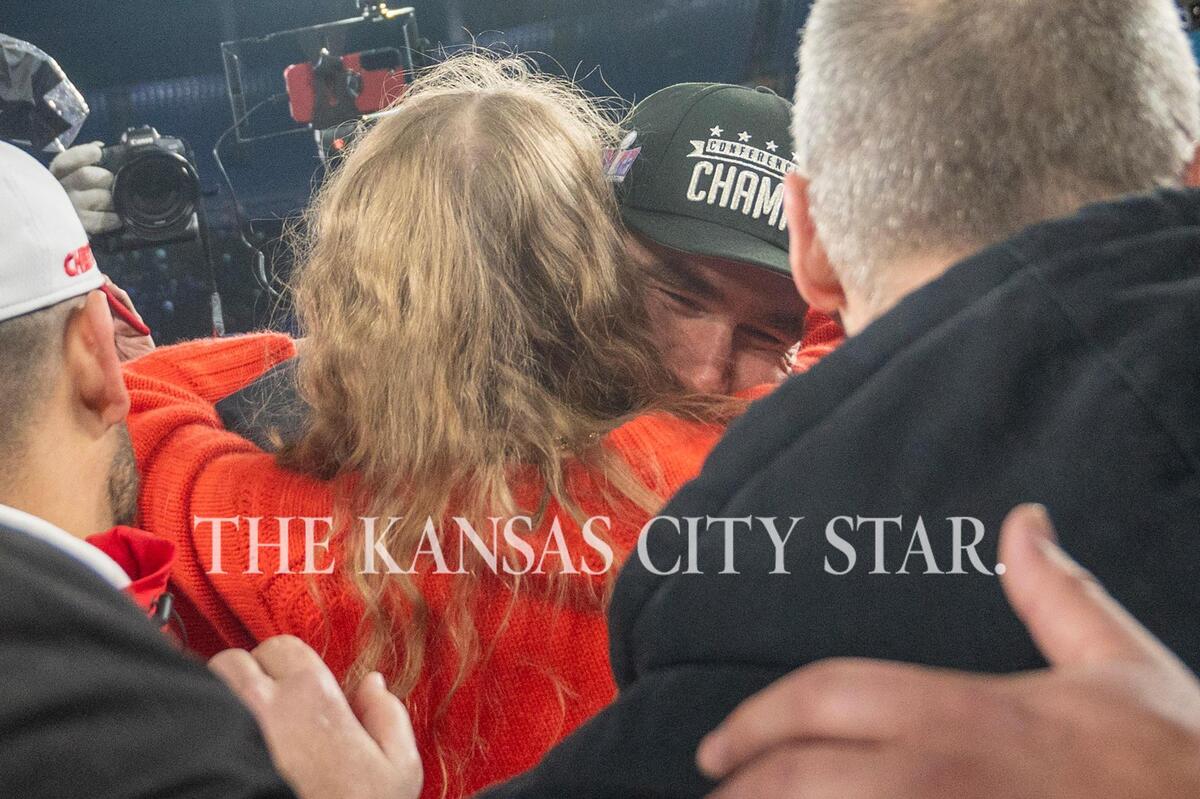 Kansas City Chiefs tight end Travis Kelce (87) hugs pop star Taylor Swift after defeating the Baltimore Ravens 17-10 in the AFC Championship Game at M&T Bank Stadium on Sunday, Jan. 28, 2024, in Baltimore.