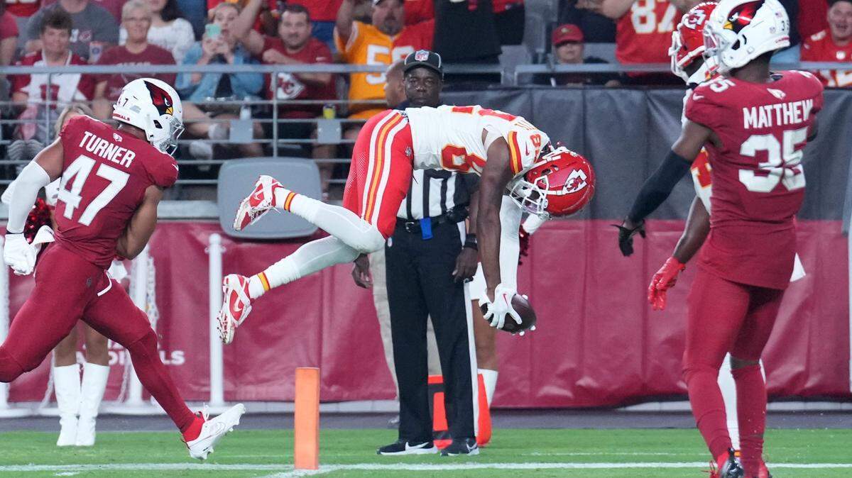 Kansas City Chiefs wide receiver Ihmir Smith-Marsette dives into the end zone for a touchdown on Saturday against the Arizona Cardinals at State Farm Stadium in Glendale, Ariz.