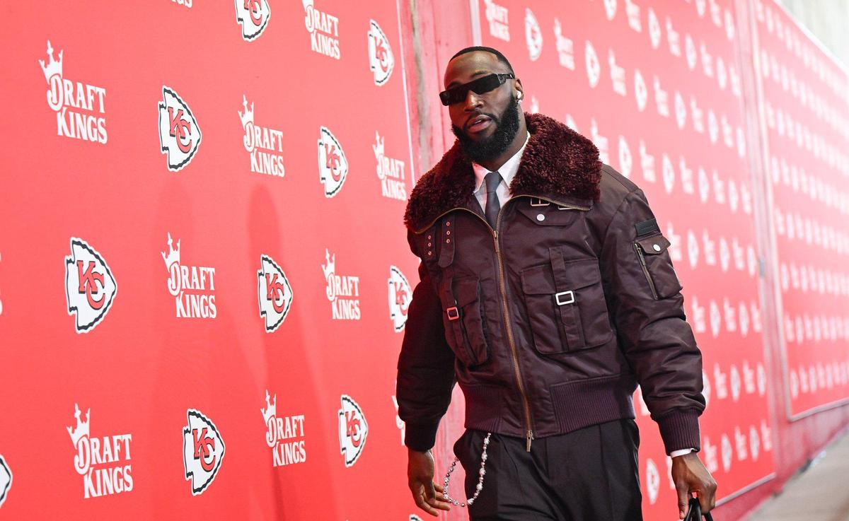 Charles Omenihu wore one of our favorite coats of the day.