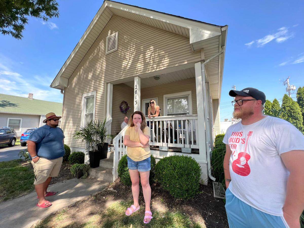 “I think we’re all saddened for the family and for the North Kansas City Police Department and our hearts go out to everybody,” said Thomas Smith, 30, who lives with his fiancée, Megan Osborn, 27, and their two children, just three doors down from where a North Kansas City Police Officer was shot during a traffic stop on Tuesday, July 19, 2022. Smith said he heard three shots and looked outside to see one officer, weak to her knees being held up by another officer. “Her brother had just gotten shot.”