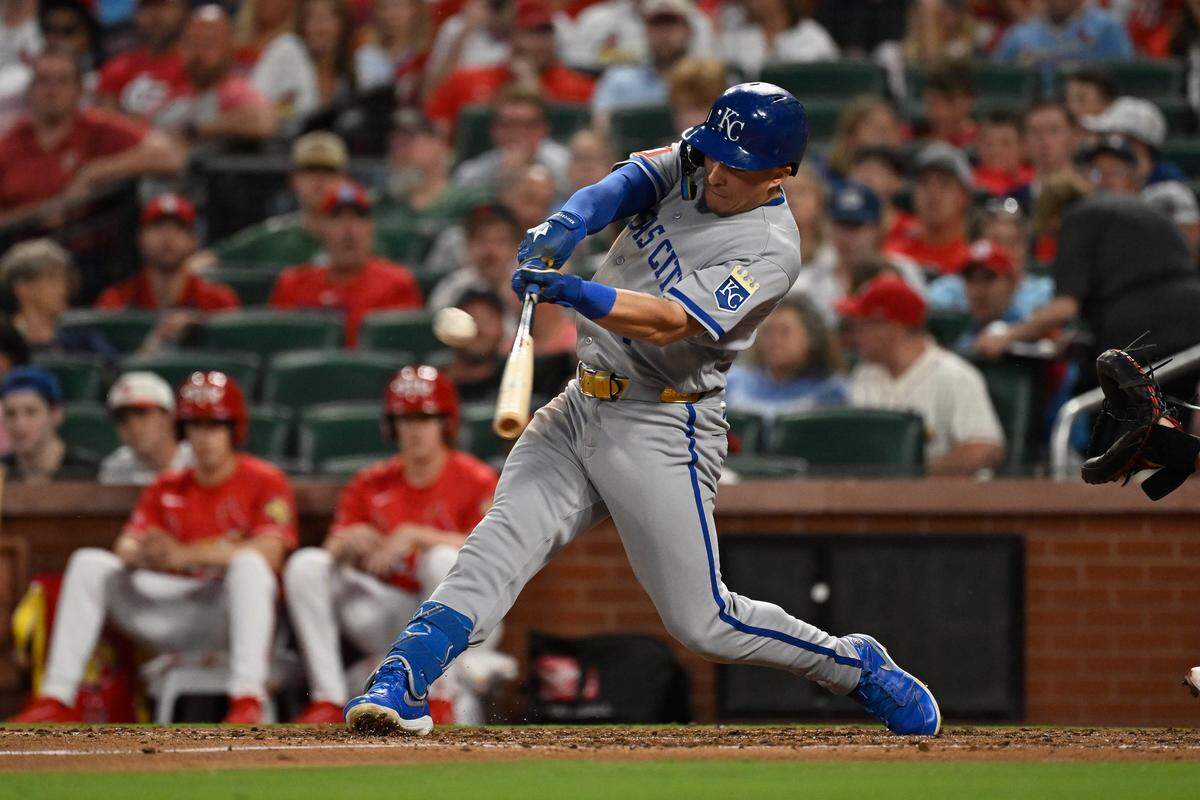 Kansas City Royals left fielder Isaac Collins hits a sacrifice fly against the Cardinals during the fourth inning of a series-opening game at Busch Stadium in St. Louis on Friday, May 15, 2026.