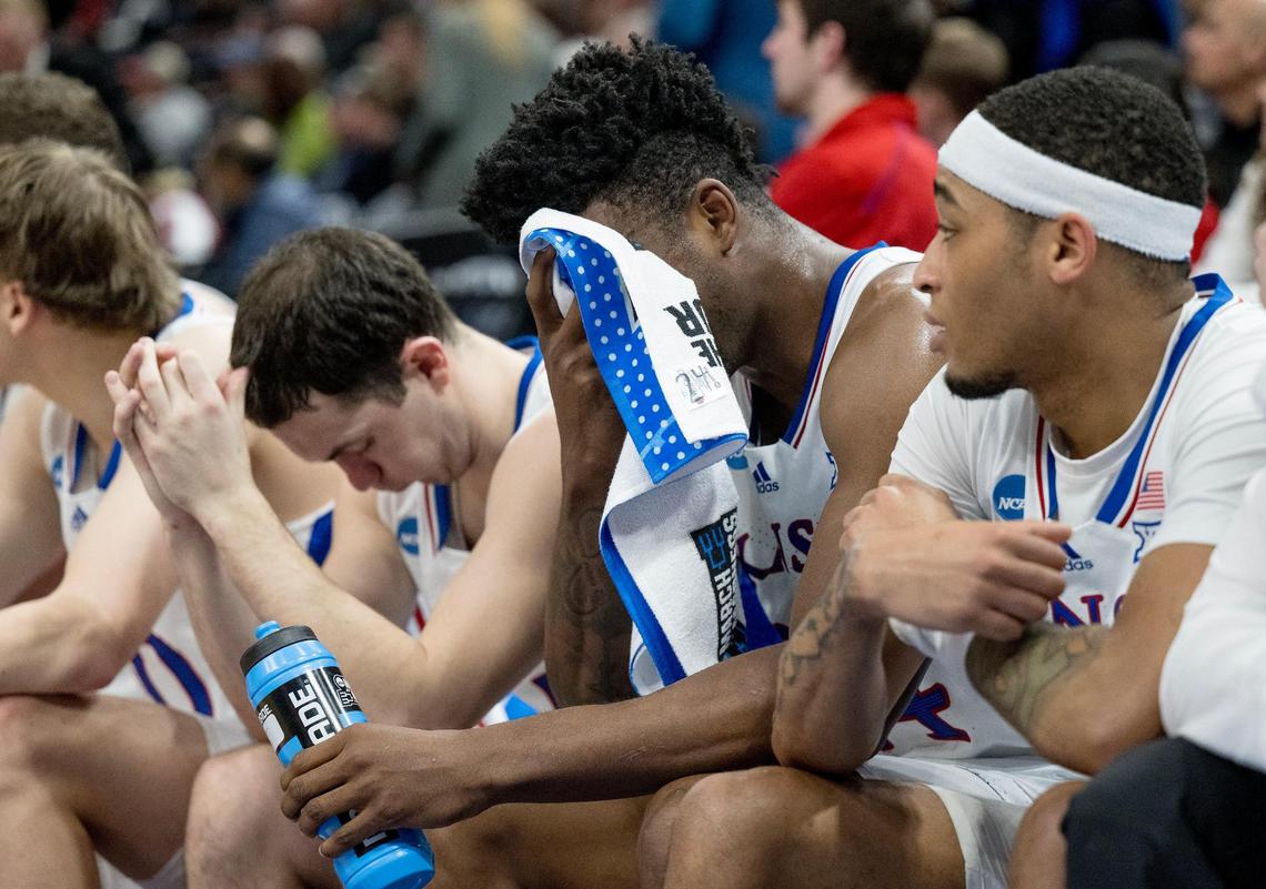 Kansas Jayhawks forward K.J. Adams (24) buries his face in a towel during a men’s college basketball game against the Gonzaga Bulldogs in the second round of the NCAA Tournament on Saturday, March 23, 2024, in Salt Lake City, Utah.