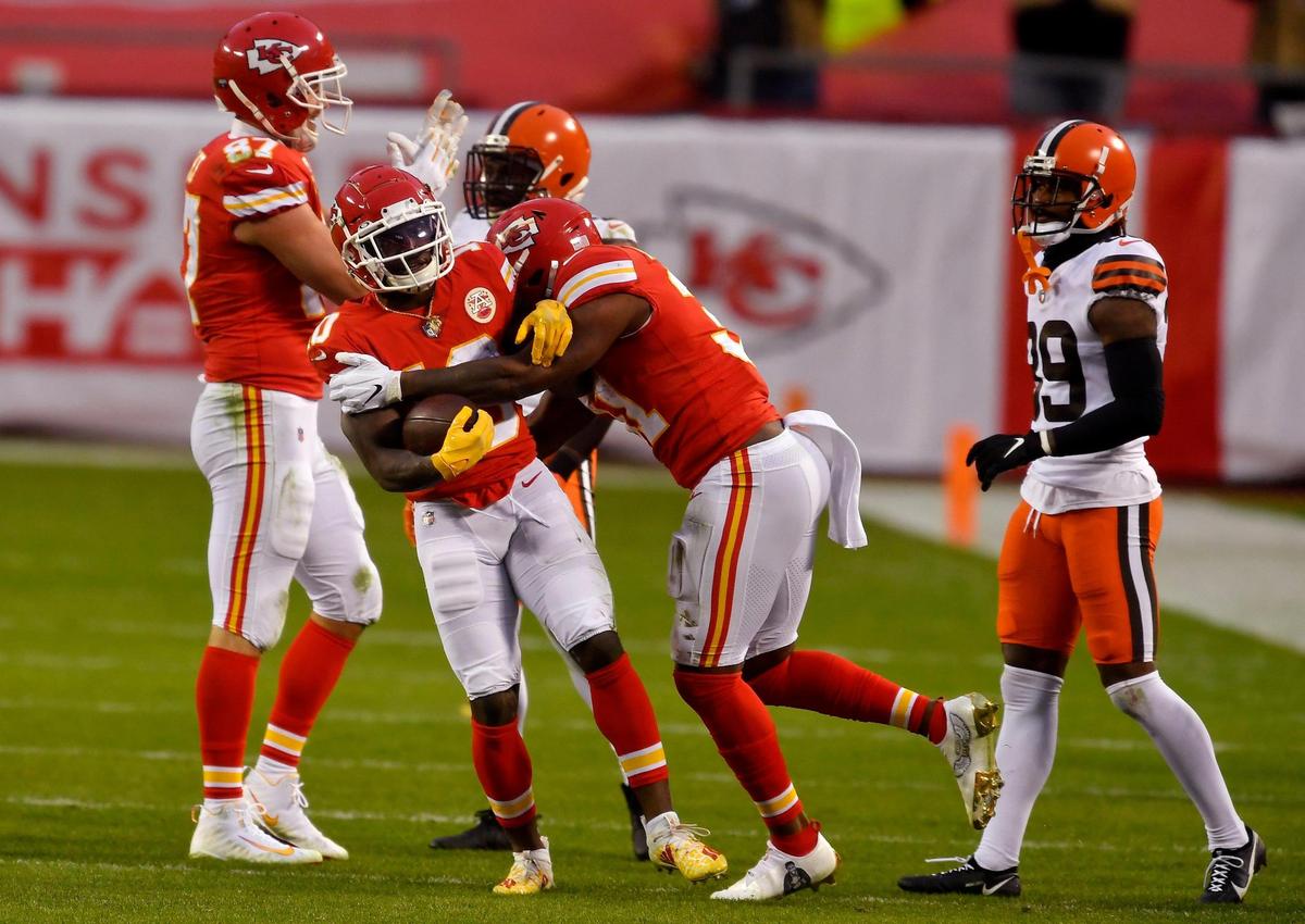 The Chiefs could celebrate after Tyreek Hill picked up the final first down to ice Sunday’s game over Cleveland.