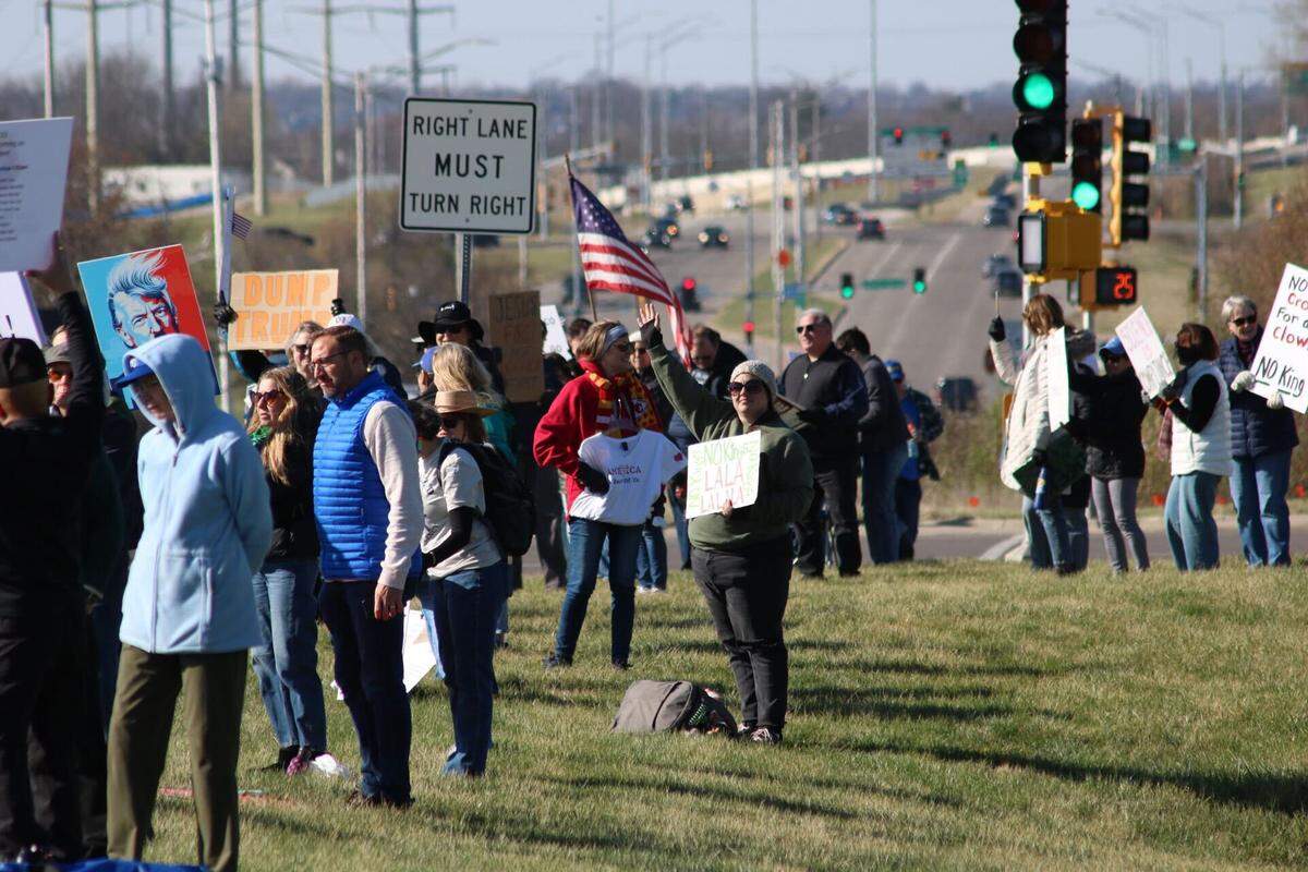 Protesters gather at 119th Street and Metcalf Ave for the No Kings rally on March 28, 2026.