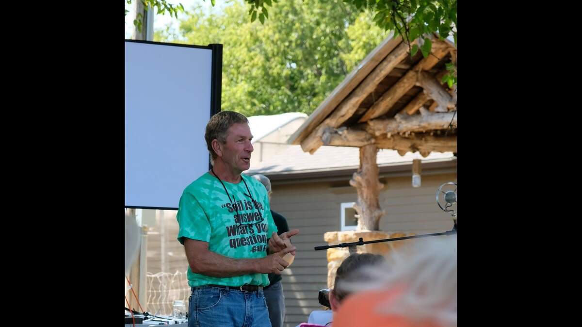 Gail Fuller speaks at the 10th annual field school he has organized, which focuses on regenerative practices.
