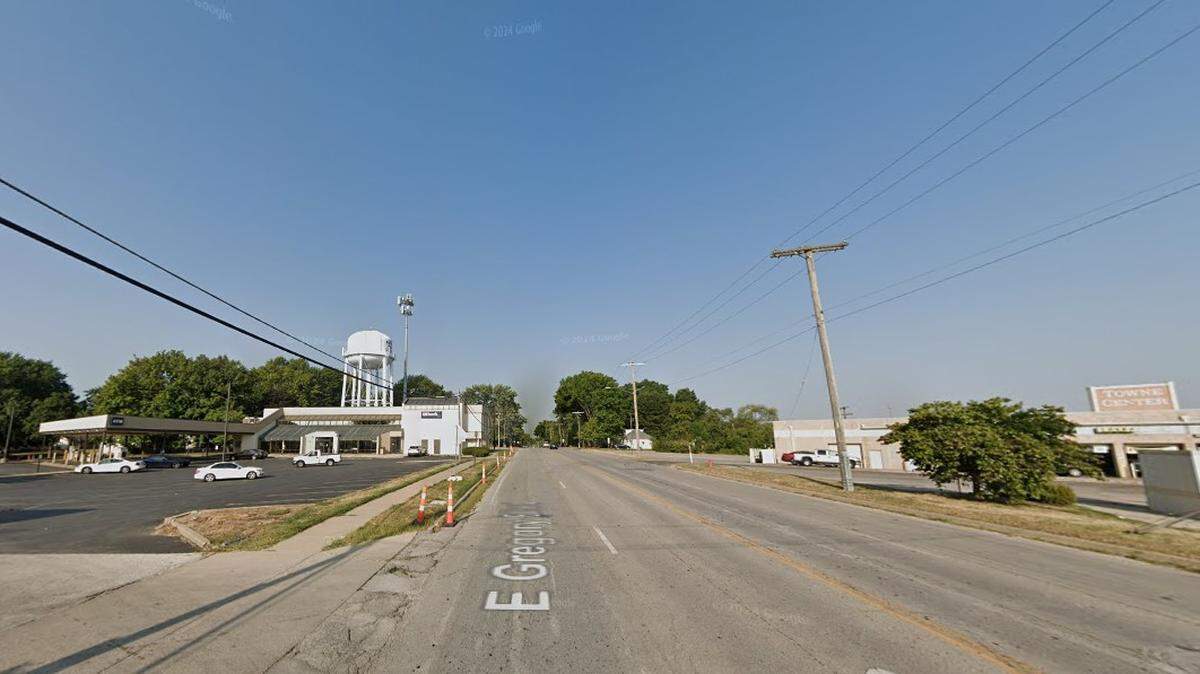 Police said a man died after he was found shot inside a vehicle near the U.S. Bank branch at 9063 East Gregory Boulevard Saturday.