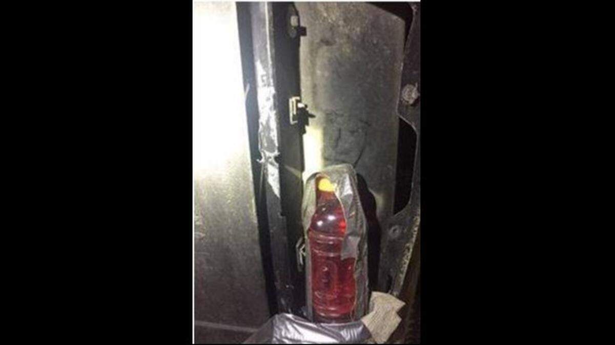 A truck driver in Colorado used a red sports drink to tint his tail light, police say.