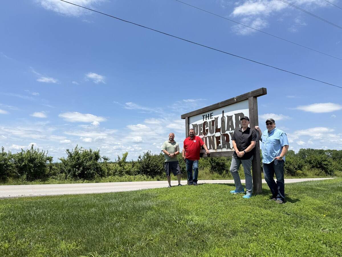 Locals who had roles in Peculiar, Missouri’s, ban on data centers, and in rebuilding trust in the city, stand outside the Peculiar Winery on June 16, 2026. The winery, where residents held community meetings to discuss the data center debate, overlooks where the center would’ve been built. Pictured from left to right are City Alderman Robert Wells, Mayor John Shatto, Peculiar Winery Owner Chris Gough and Chad Buck, a lead community organizer during the debate.