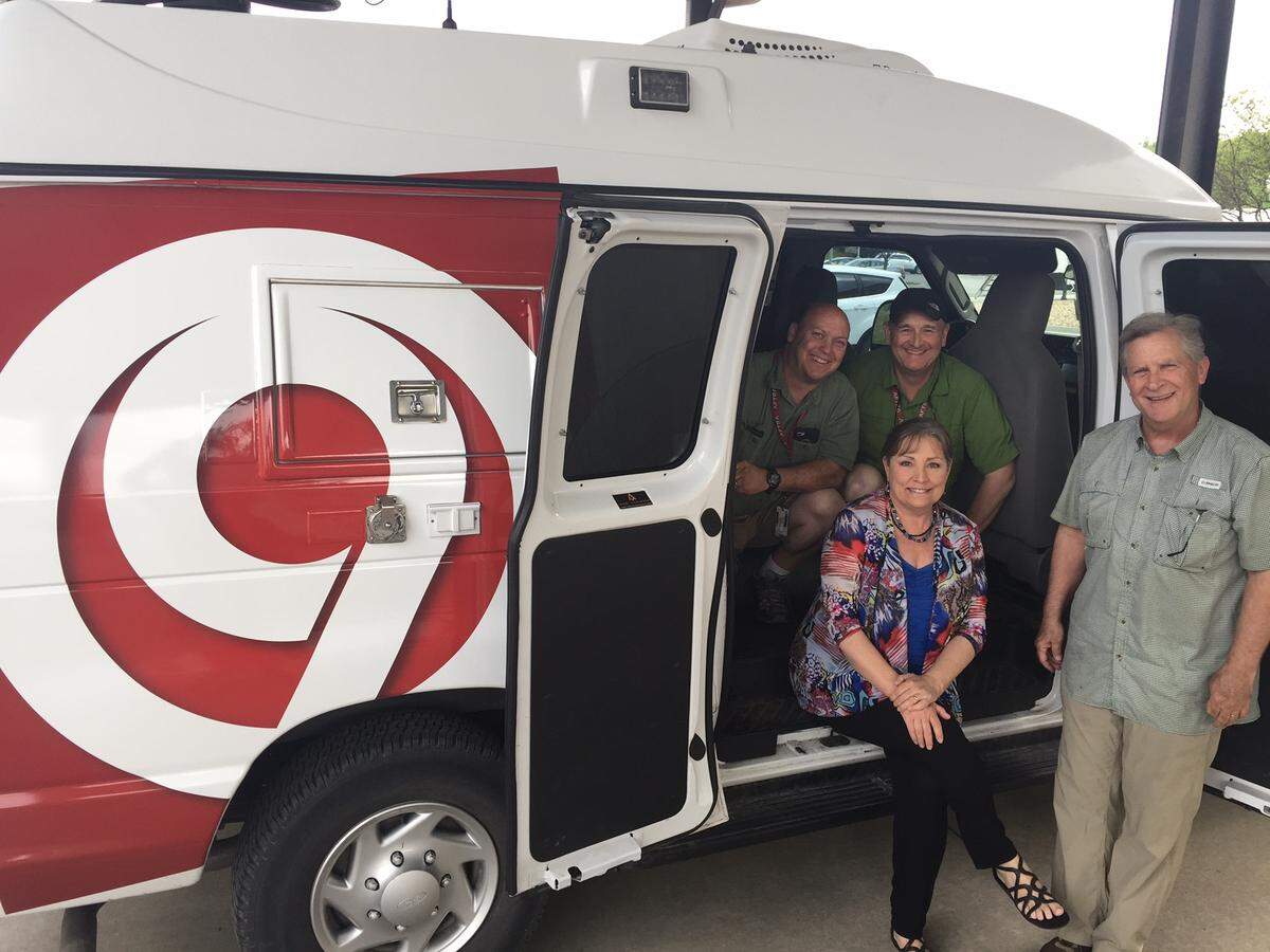 Breit, middle, and the KMBC Channel 9 photographers she works with daily. L-R: Mark Lea, Mark Midgorden and Dick Kasper. Breit will retire at the end of June.