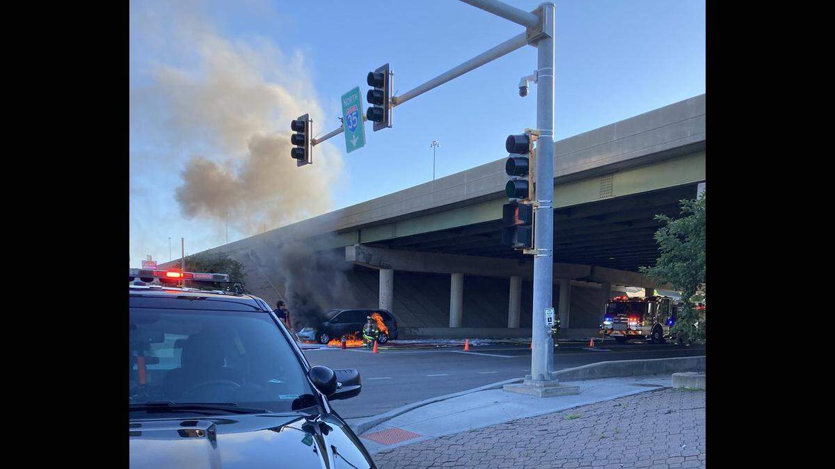 A car caught fire during the morning rush hour and forced police to close Johnson Drive under Interstate 35 in Merriam. Flames could coming from the vehicle.
