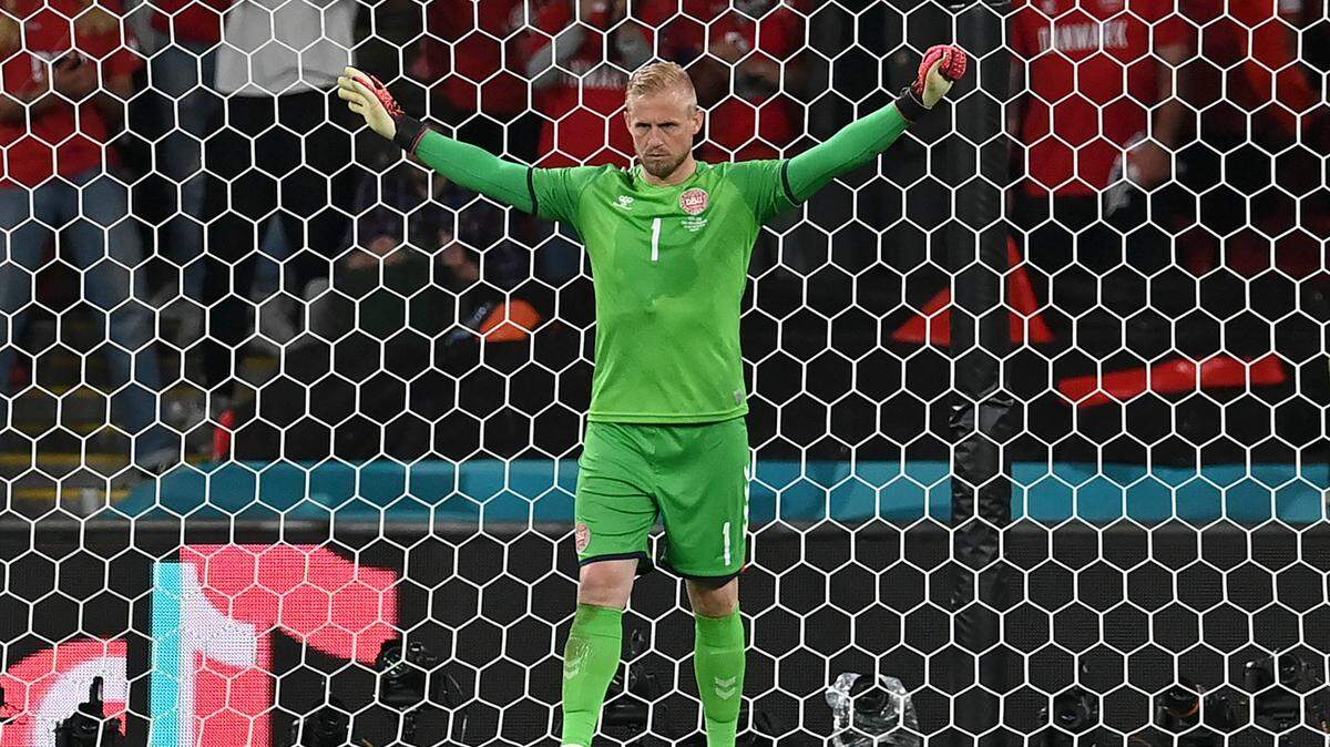 Denmark’s goalkeeper Kasper Schmeichel prepares for England’s Harry Kane to take a a penalty kick during the Euro 2020 soccer championship semifinal match between England and Denmark at Wembley stadium in London, Wednesday, July 7, 2021. (AP Photo/Paul Ellis, Pool)