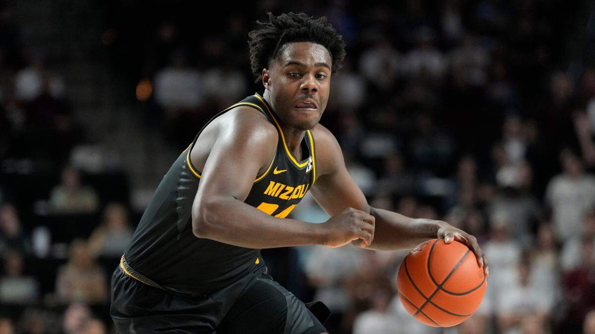 Missouri guard Kobe Brown drives the lane against Texas A&M during the first half of a game Wednesday, Jan. 11, 2023, in College Station, Texas.