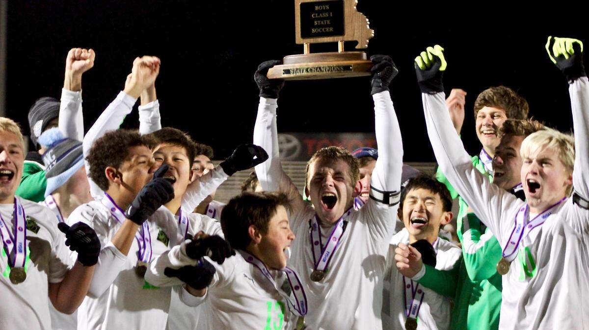 Barstow celebrates after winning the Missouri Class 1 boys high school soccer championship in Fenton Saturday night.