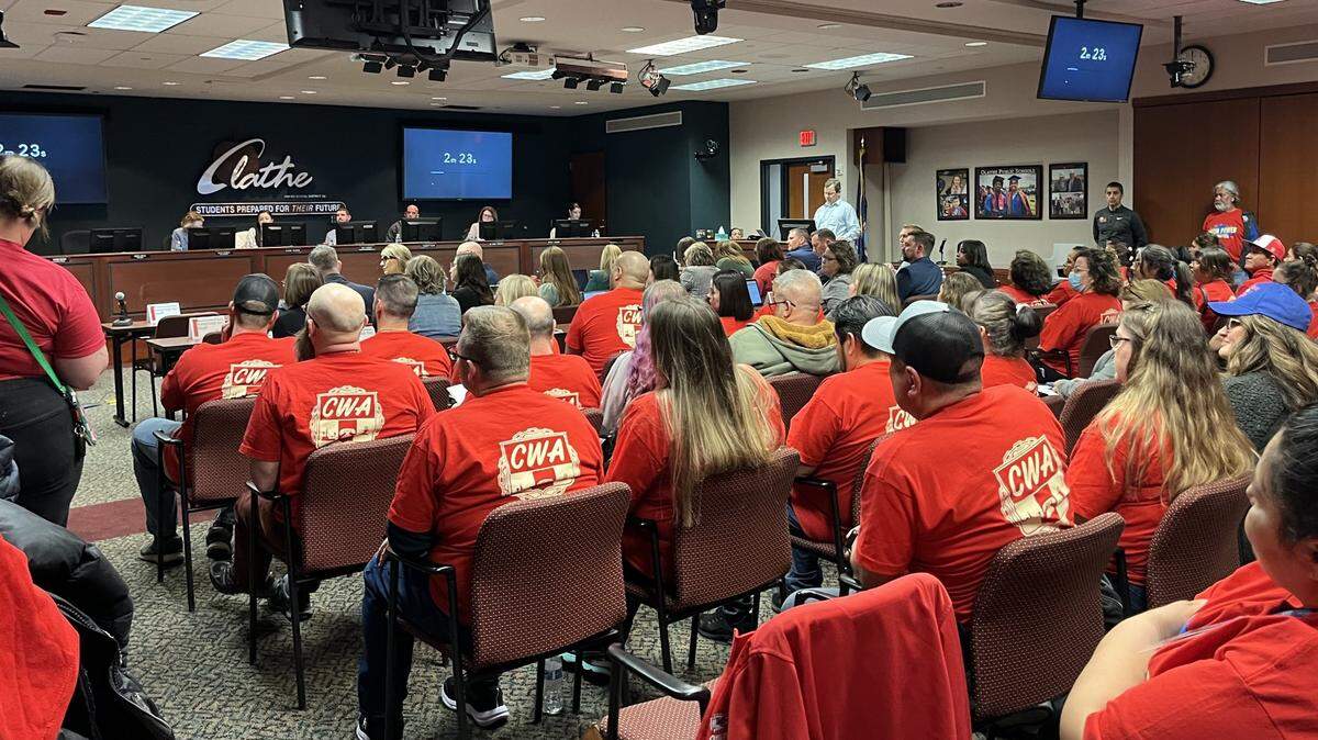 Roughly 70 hourly workers, including custodians and paraprofessionals, packed the Olathe school board meeting, advocating for a union to fight for better wages and working conditions.