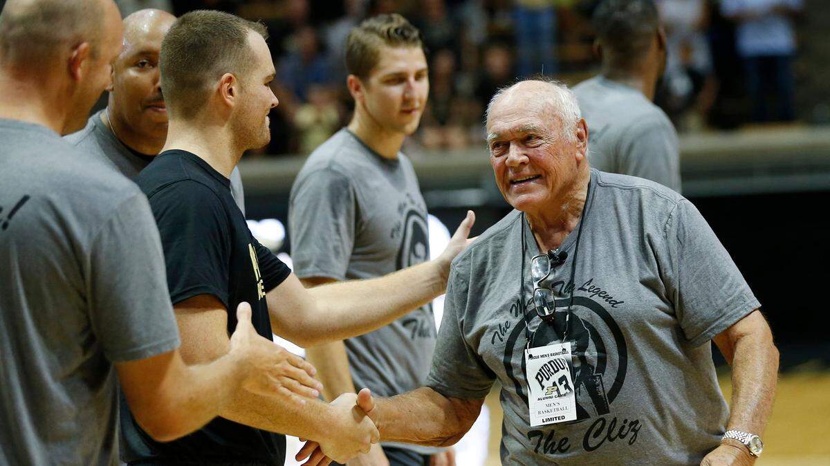 Gene Keady shakes hands with his players before the Purdue Alumni basketball game Saturday, August 4, 2018, at Mackey Arena.