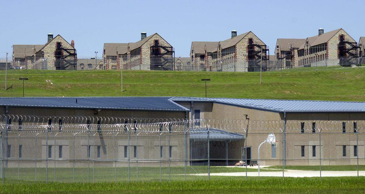 Maximum security housing units at the Jefferson City Correctional Center sit below dormitory-style housing at the minimum security Algoa Correctional Center.