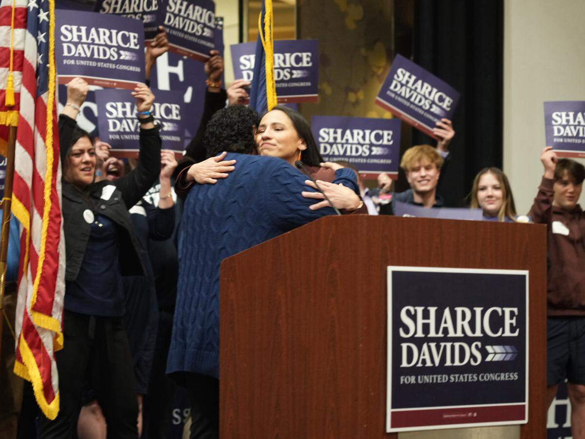 Sharice Davids hugs her mother as they joined supporters at an election watch party Tuesday night at Sheraton Overland Park Hotel.