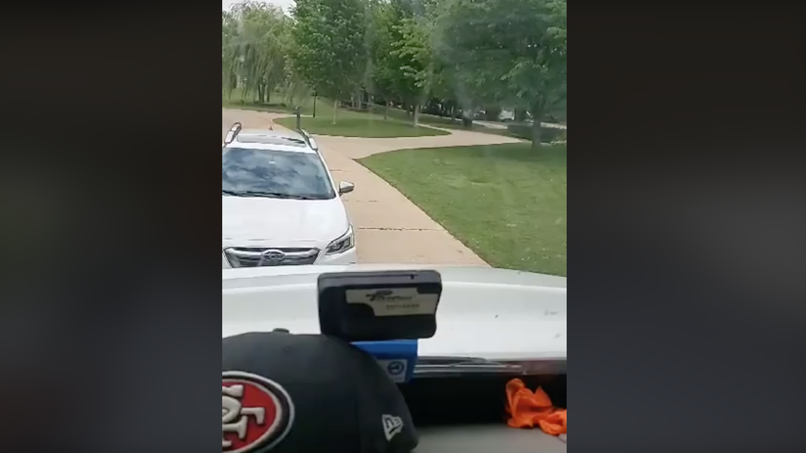 A delivery driver in Oklahoma filmed his interaction with a man he says blocked his exit from a gated community.