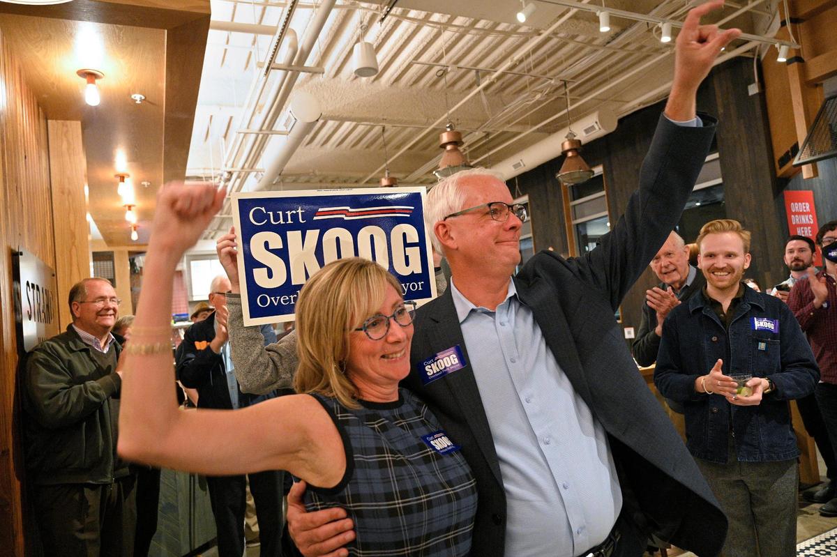 Longtime Councilman Curt Skoog celebrated his 2021 win in the Overland Park mayoral race, with his wife Amy, at his watch party at Strang Hall.