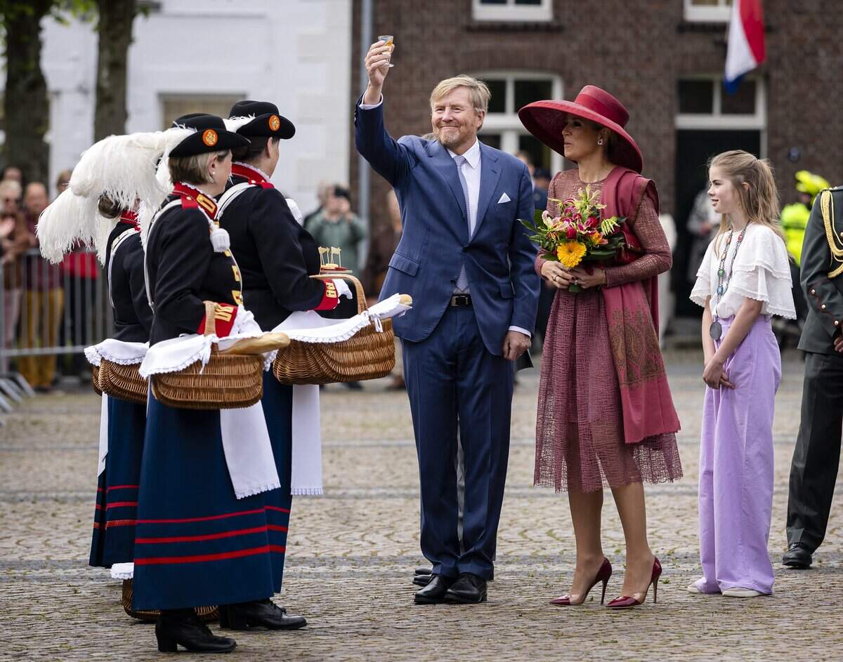 Netherlands' King Willem-Alexander and Queen Maxima greet well-wishers during a regional visit to the municipalities of Maasgouw, Echt-Susteren, Roerdalen, and Roermond on May 19, 2026, in the Central Limburg region close to the border between Belgium and Germany.