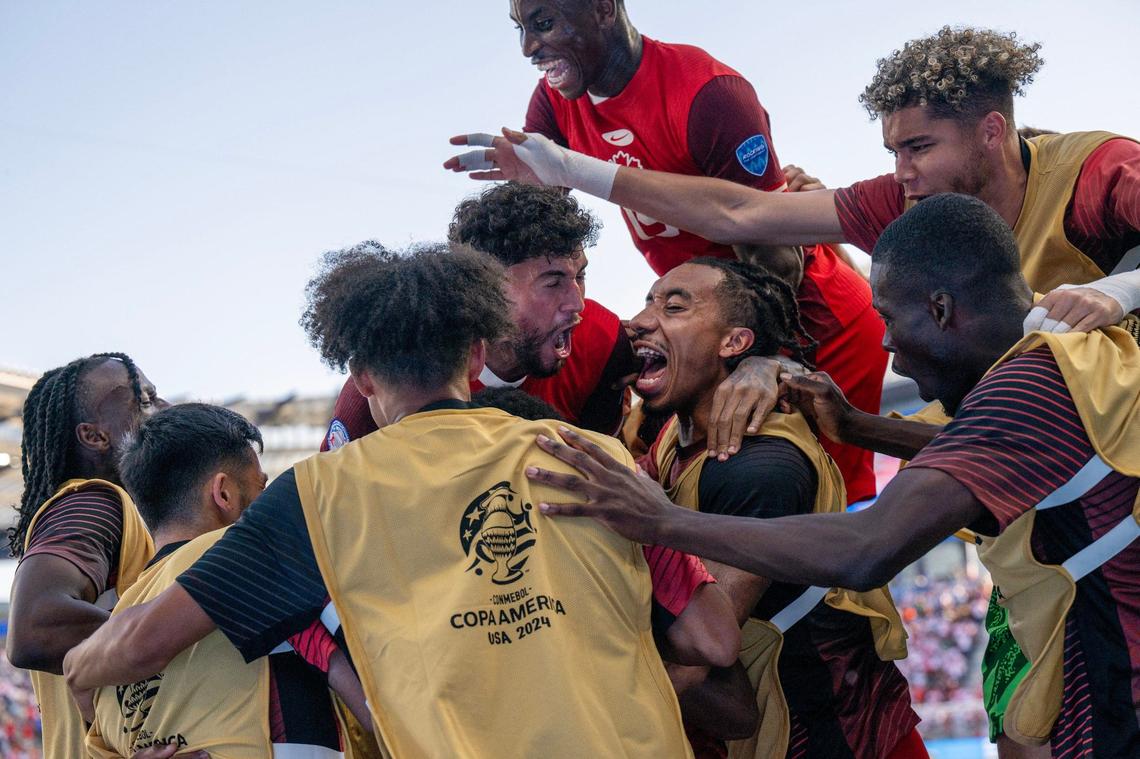 Canada players celebrate after forward Jonathan David (10) scores a goal in the second half of a Copa America match against Peru.