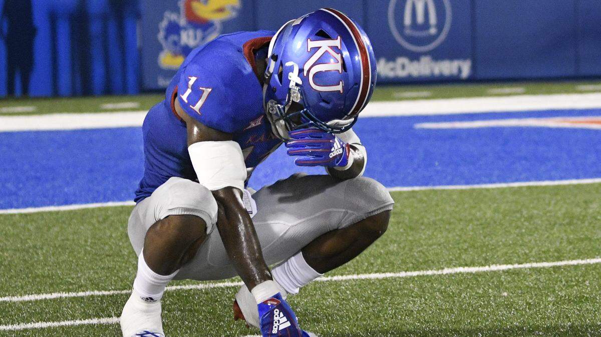 Kansas safety Mike Lee paused on the field after the Jayhawks lost to Nicholls State in Lawrence.