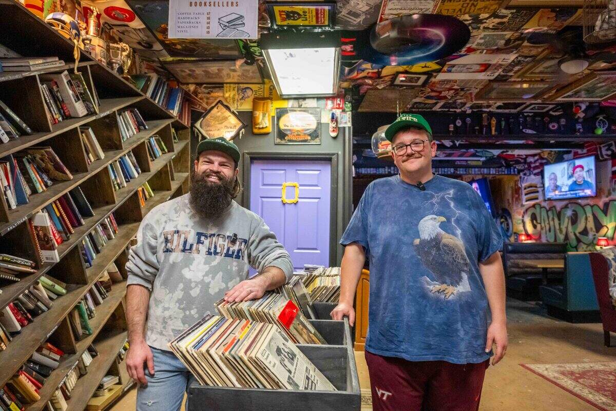 Owners Alex Quinn and Pat Clifton inside Gnarly Hussle. The two have been in the vintage clothing game for several years but only recently opened a bar inside the back of the shop to serve as a “third place” for the community.