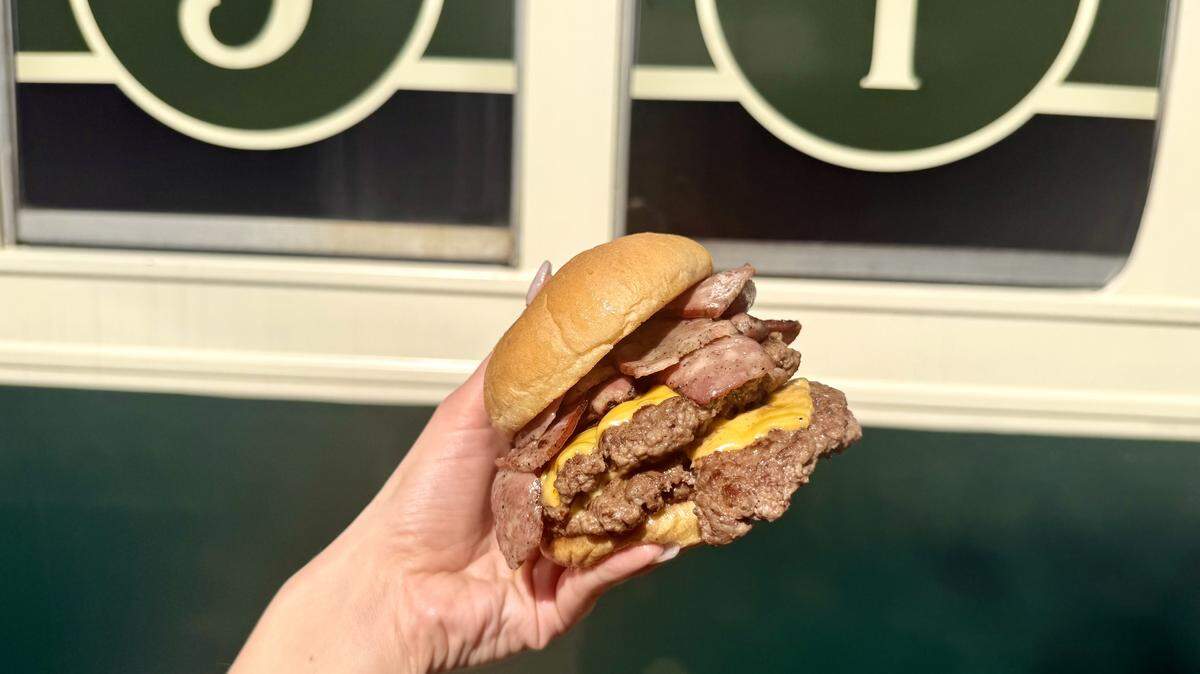 Car No. 551 offers The Hog & Heifer, a half-pound double cheeseburger with a quarter-pound of kielbasa.