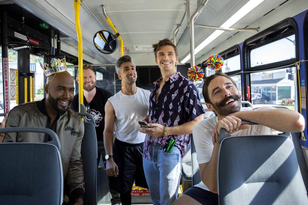 From left: Karamo Brown, Bobby Berk, Tan France, Antoni Porowski, and Jonathan Van Ness, inside a RideKC bus.