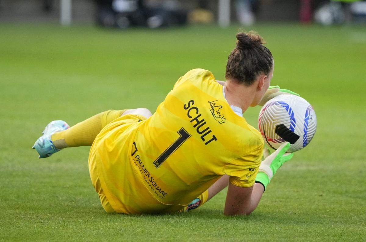 Kansas City Current goalkeeper Almuth Schult makes a save against the North Carolina Courage in a NWSL playoff match at CPKC Stadium on Saturday, Nov. 9, 2024.