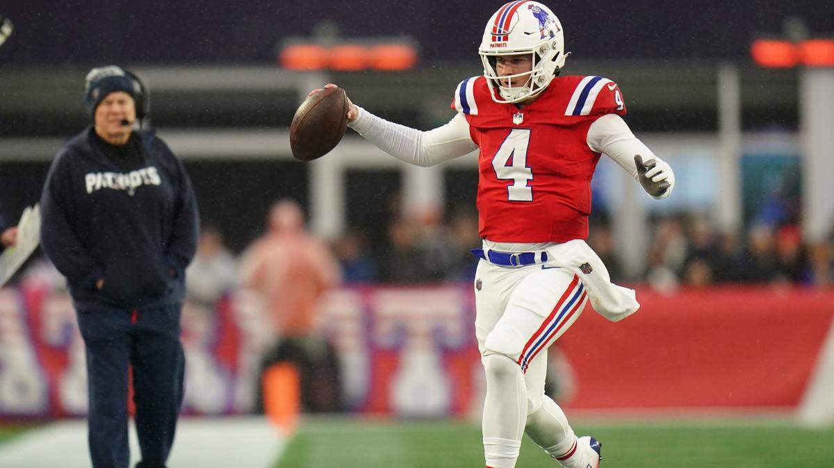New England Patriots quarterback Bailey Zappe (4) runs the ball against the Los Angeles Chargers in the second half of a game earlier this month at Gillette Stadium.