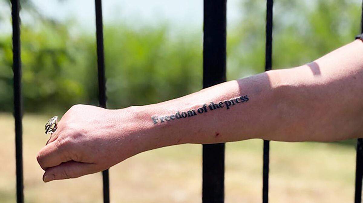Marion County Record reporter Deb Gruver on Wednesday had the words “Freedom of the press” tattooed on her forearm. In her lawsuit, she accuses Police Chief Gideon Cody of “recklessly” violating her constitutional rights.