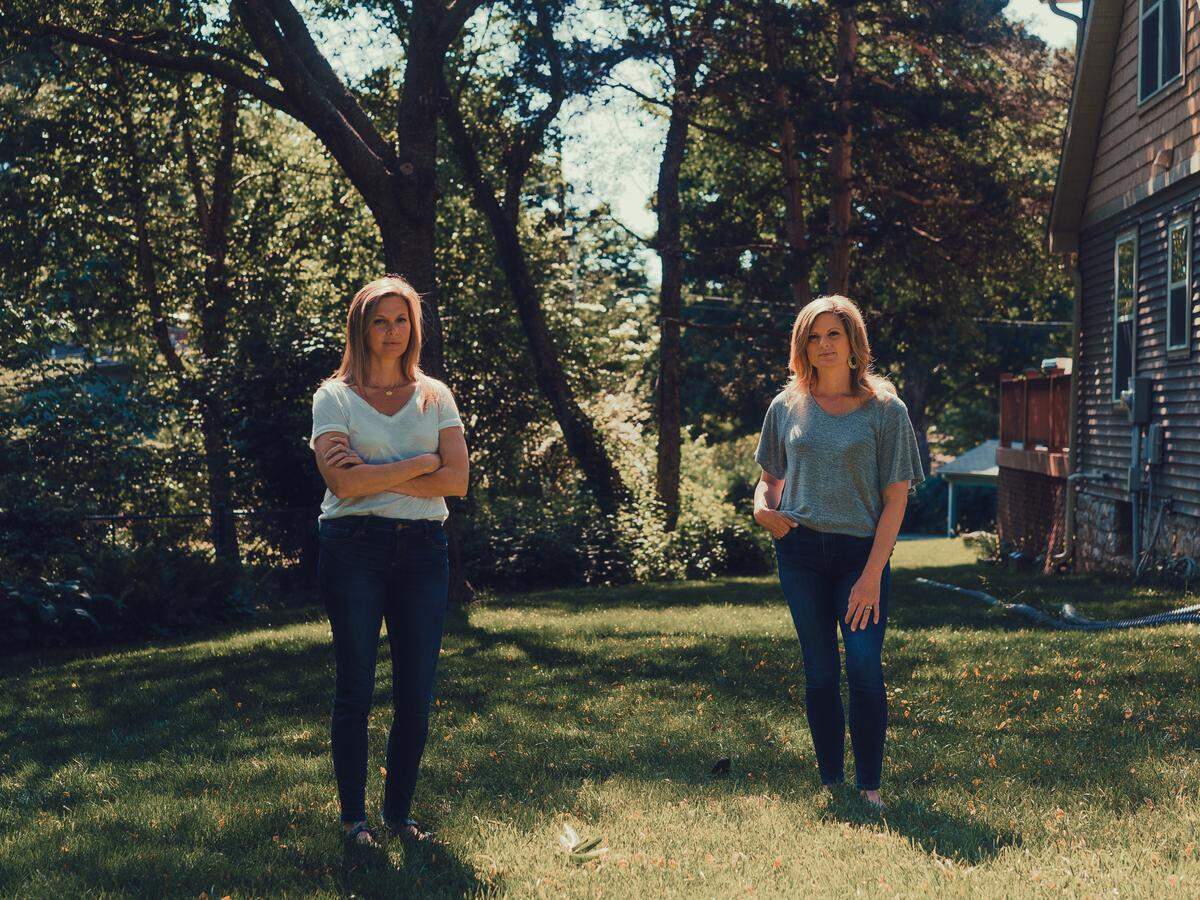 Heather Wiley, left, and Ellie Lilly outside Wiley’s Independence home earlier this year. The sisters were among the first to have an unproven coronavirus vaccine injected in their bodies.