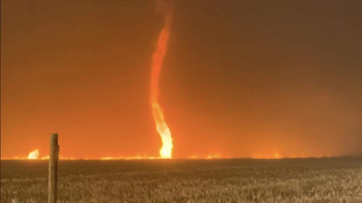 Storm chasing meteorologist Reed Timmer posted video of a fire whirl - also known as a firenado - racing across a southwest Kansas field on Tuesday. Wildfires that blew into the state from Oklahoma forced the evacuation of several communities.