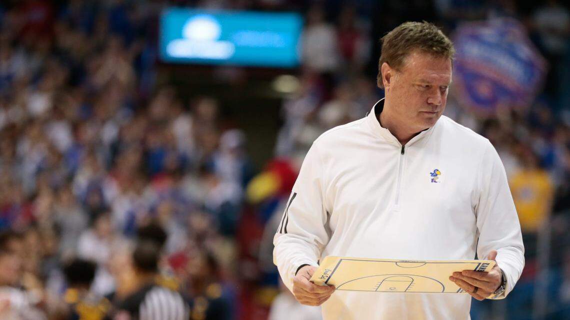 Kansas coach Bill Self walks to the bench after a timeout during the second half of a 2022-23 game against West Virginia inside Allen Fieldhouse.