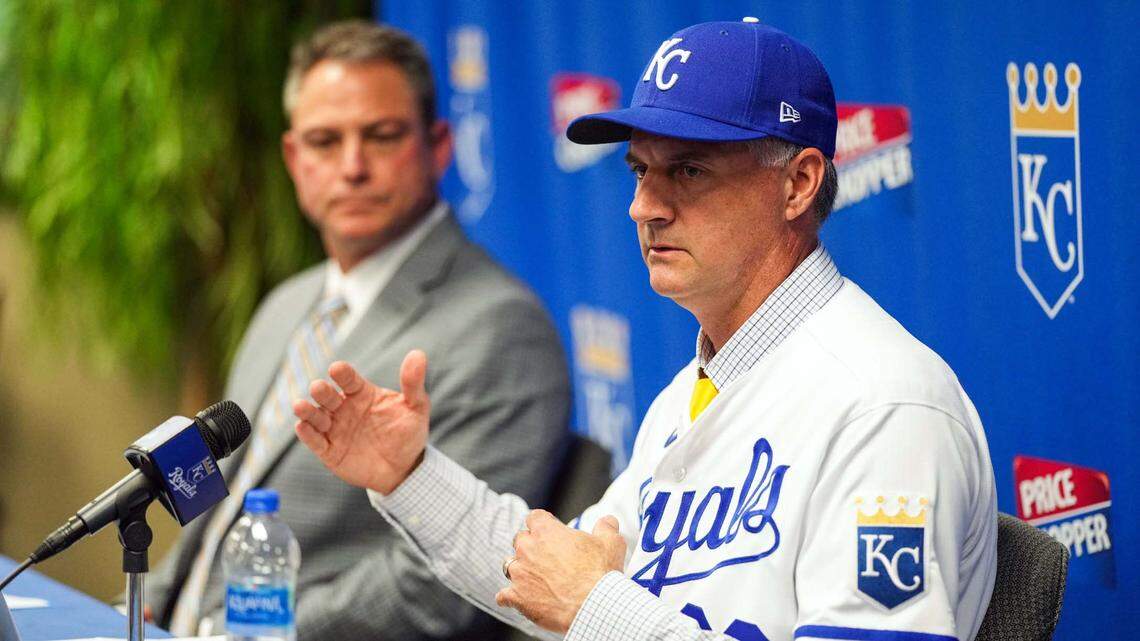 Kansas City Royals manager Matt Quatraro (33) and general manager J.J. Picollo talk with media during a press conference at Kauffman Stadium on Nov. 3, 2022.